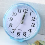 Enhance your home decor with our battery-operated round silent alarm clock. Stylish and functional, it features a minimalist design that complements any room while ensuring a peaceful atmosphere