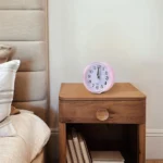 Enhance your home decor with our battery-operated round silent alarm clock. Stylish and functional, it features a minimalist design that complements any room while ensuring a peaceful atmosphere